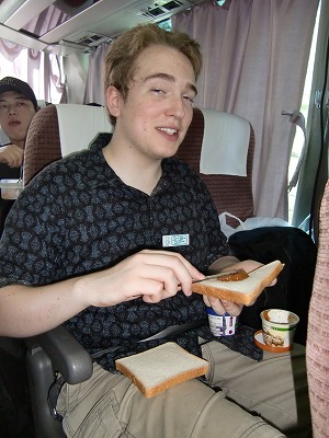 KCP student having a meal on the bus.