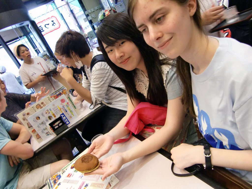 KCP students trying Iseya's sweets