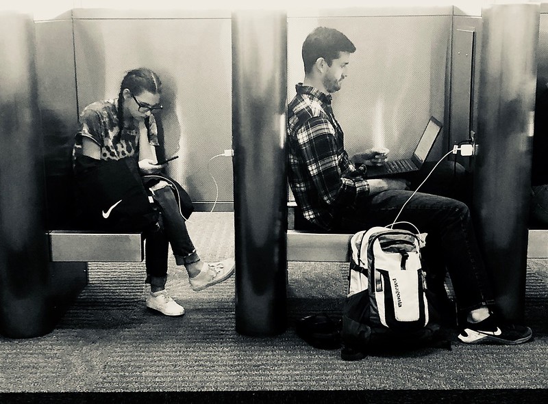 People using digital devices.