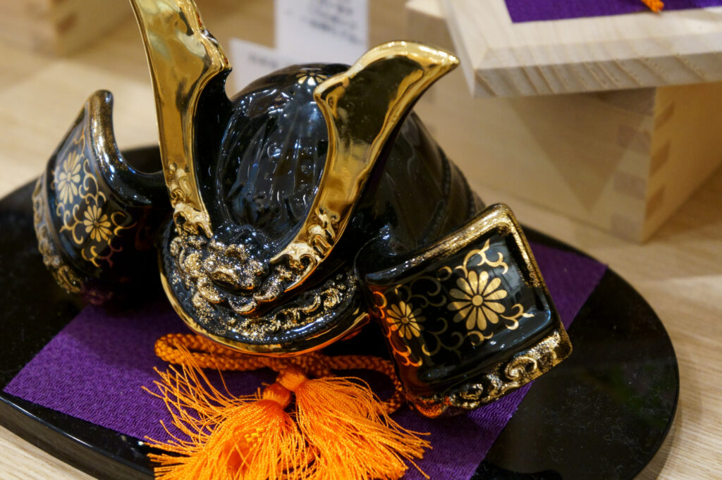 Traditional Japanese samurai helmet displayed indoors.